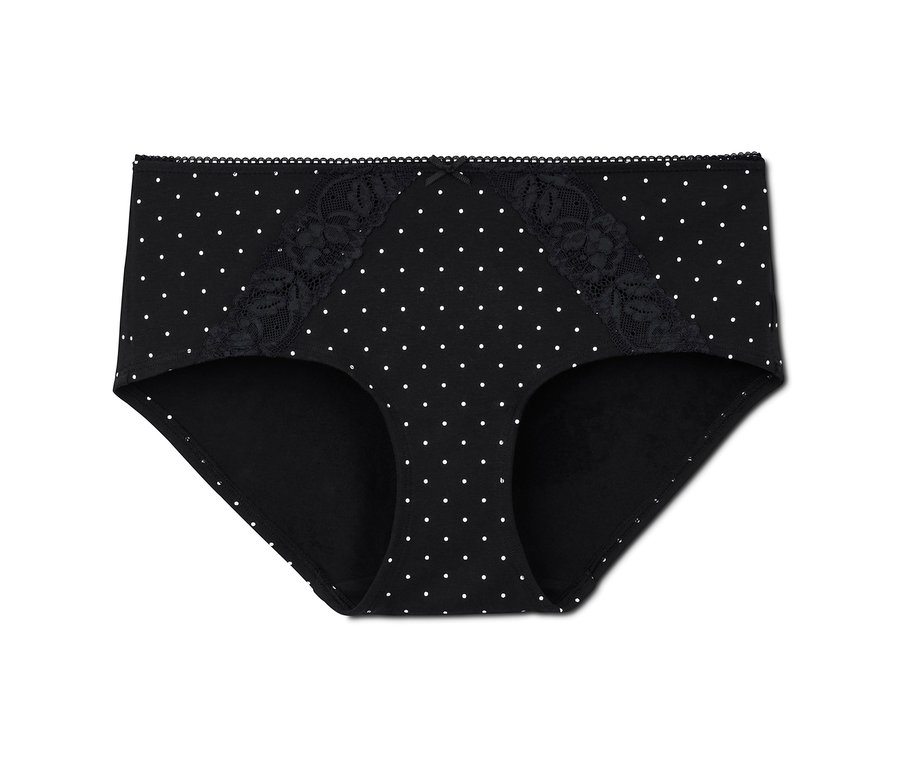 Ein Paar schwarze Pantys mit weißen Punkten.