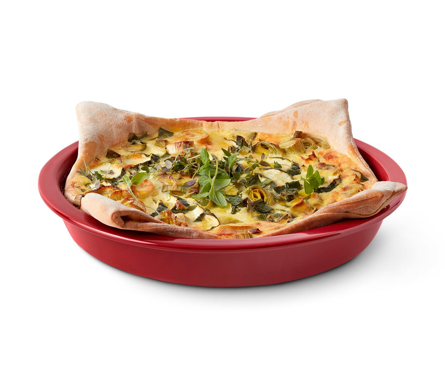 Quiche in einer Tarteform.