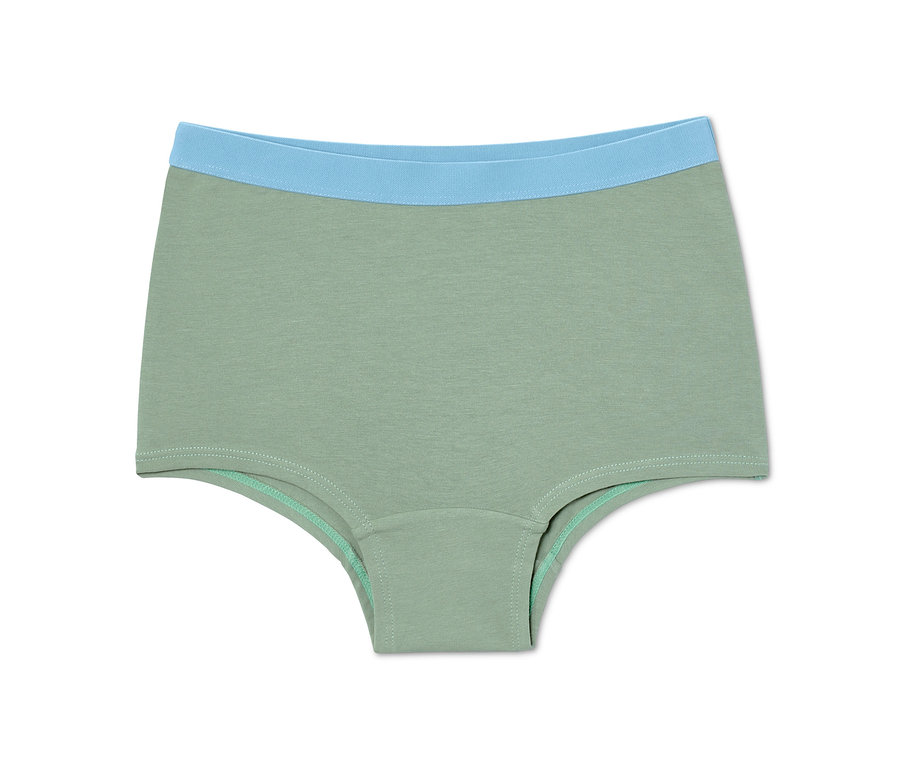 Eine grüne Mädchen-Panty (7 Mädchen-Pantys) mit blauem Bund.