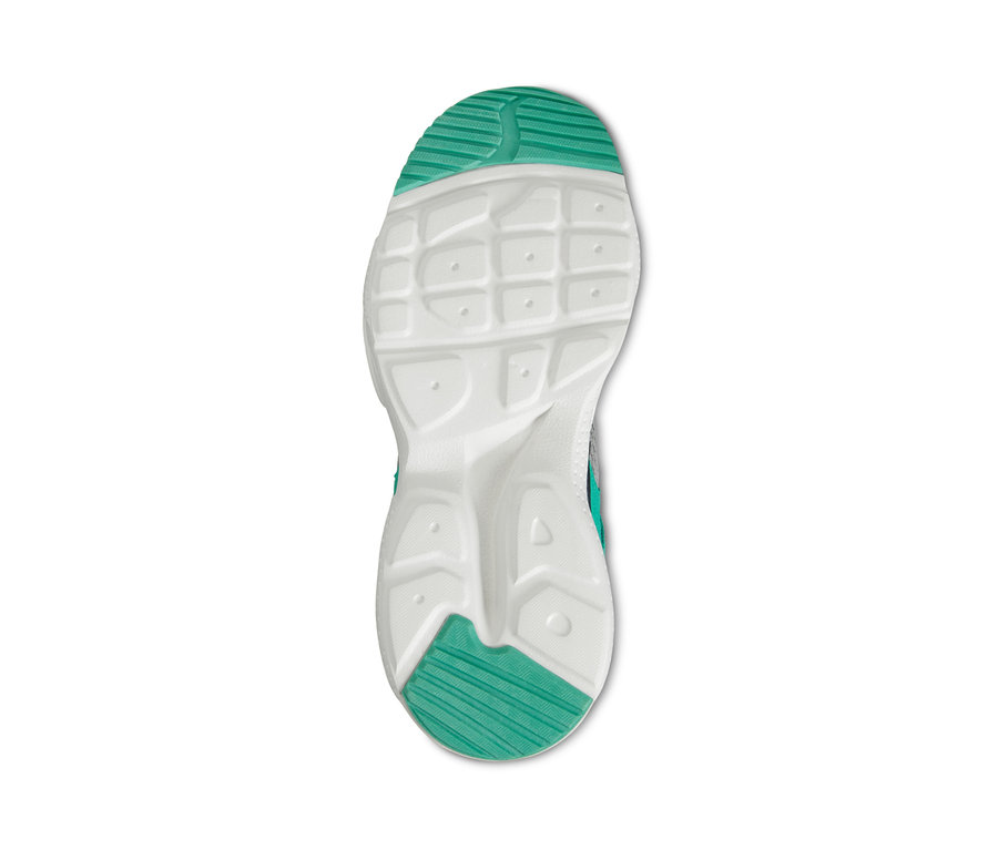 Die Sohle eines Sneakers ist weiß mit türkisfarbenen Akzenten.