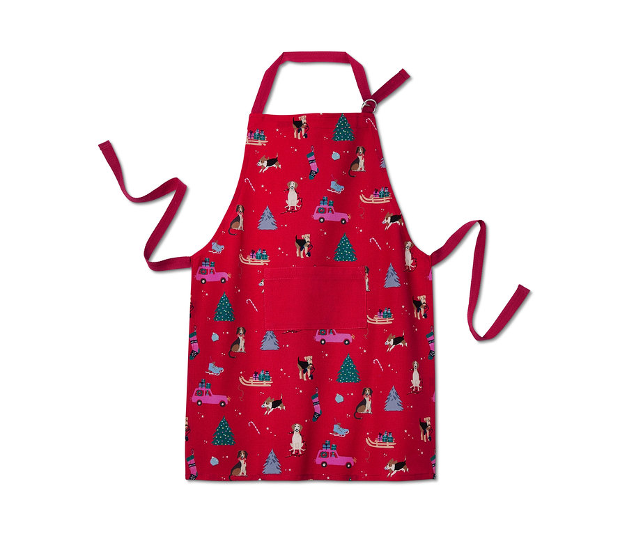 Eine rote Küchenschürze mit Weihnachtsmotiv.