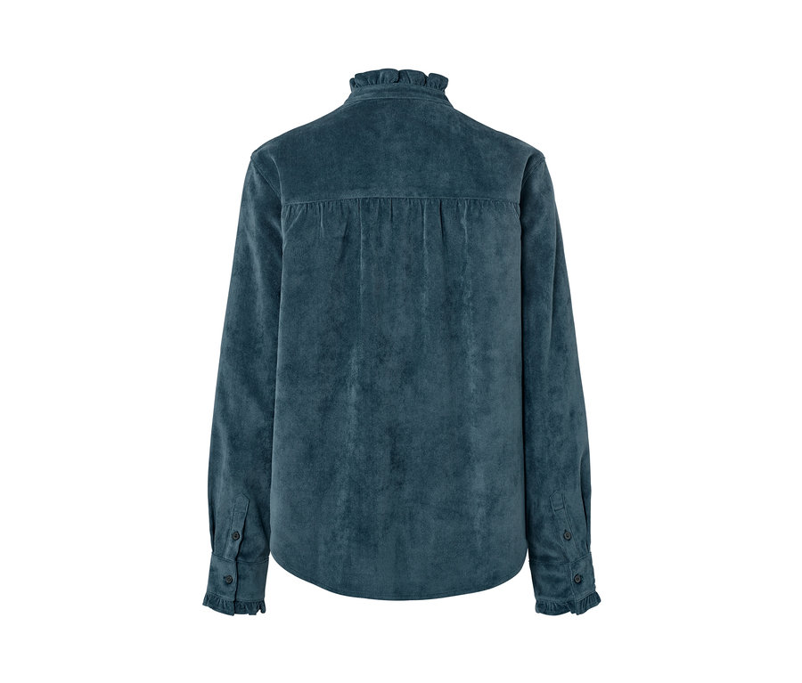 Rückansicht der Cordbluse mit Rüschendetail.