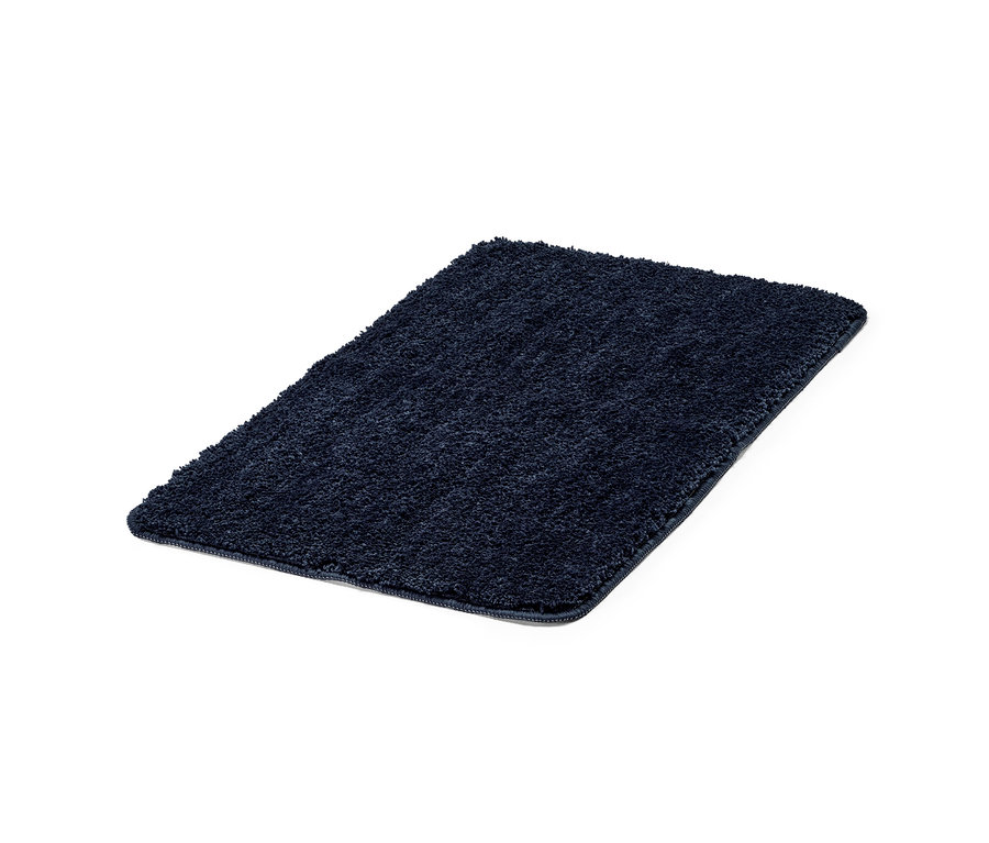 Eine blaue Badematte, ca. 45 x 75 cm.