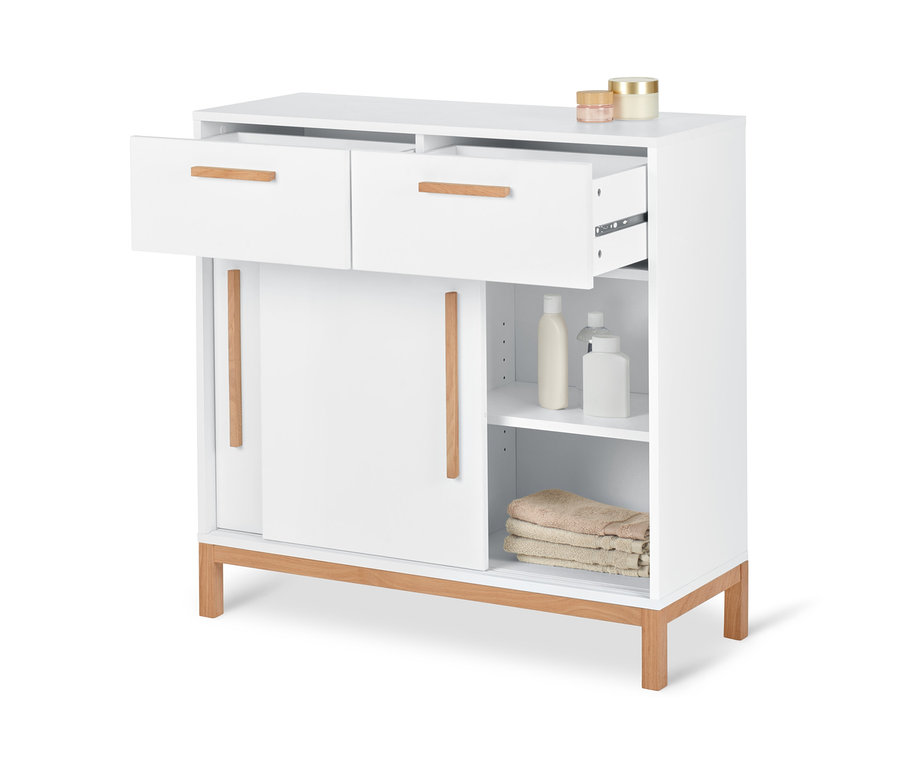 Weißes Sideboard »Eklund« mit 2 Schubladen und Schiebetüren, eine Schublade ist geöffnet.