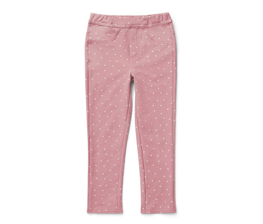 Rosa Kinder-Jeggings ‒ Fit »Ida« mit weißen Punkten auf weißem Hintergrund.