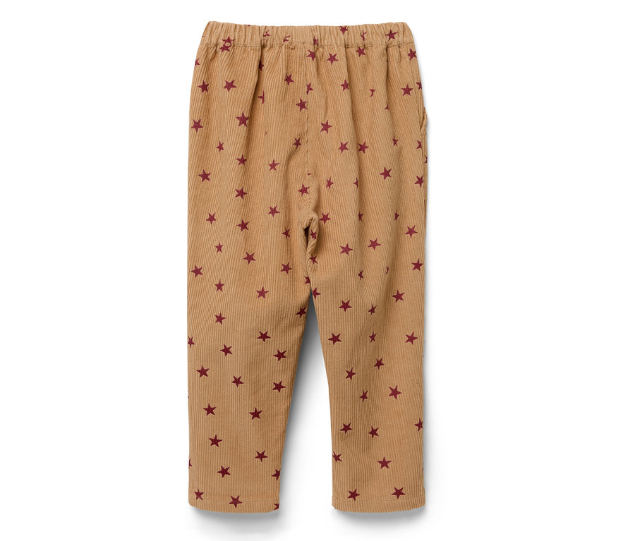 Braune Cordhose mit roten Sternen.