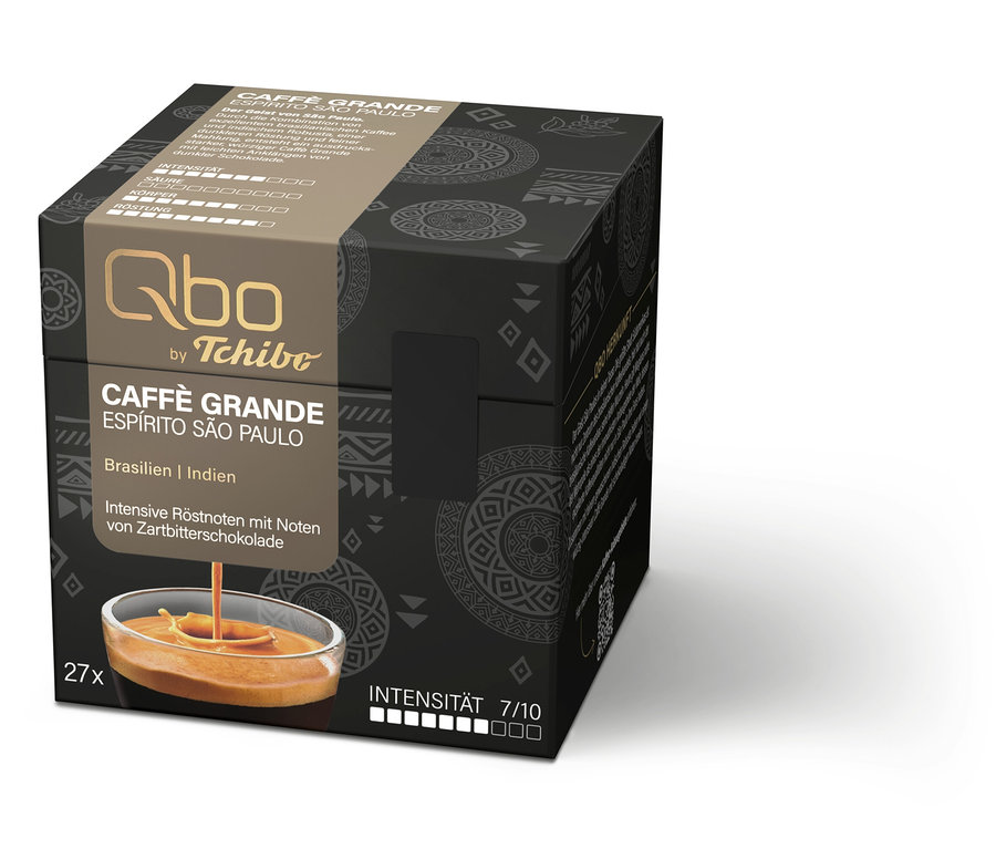 Eine geöffnete, schwarze Qbo by Tchibo Caffè Grande Espírito São Paulo Kapselbox mit 27 Kaffeekapseln ist zu sehen.