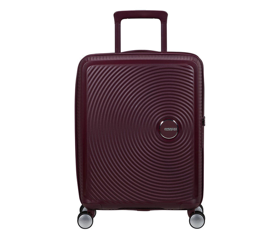 Kleiner American Tourister Soundbox Spinner Hartschalen-Koffer in Wildkirschrot mit konzentrischen Kreisen und ausgefahrenem Griff.