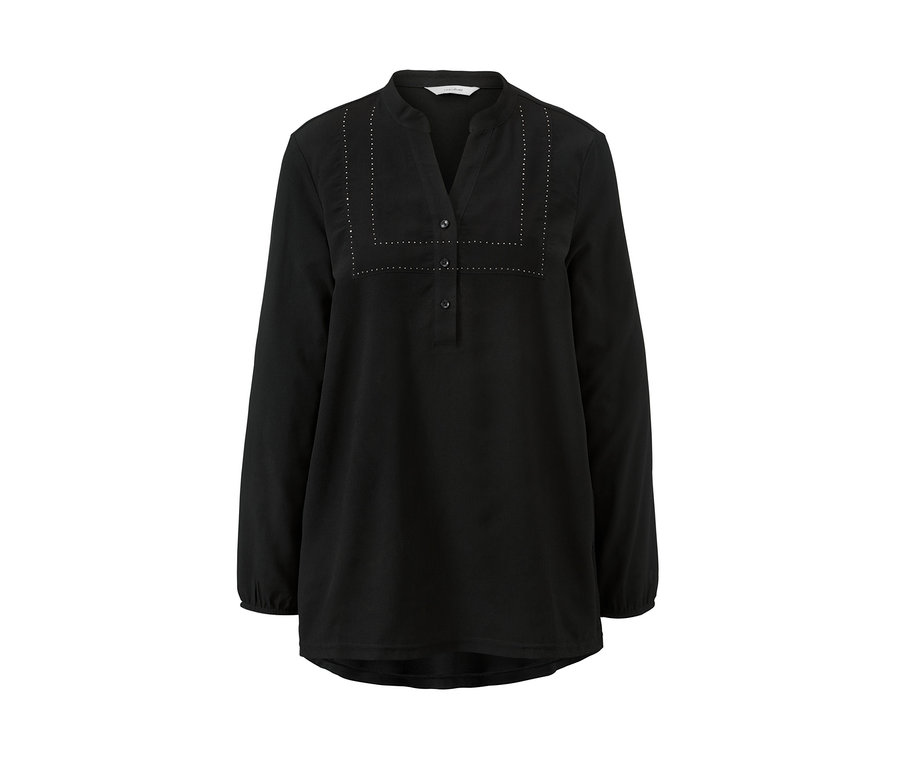 Eine schwarze Tunikabluse im Materialmix mit V-Ausschnitt und langen Ärmeln.