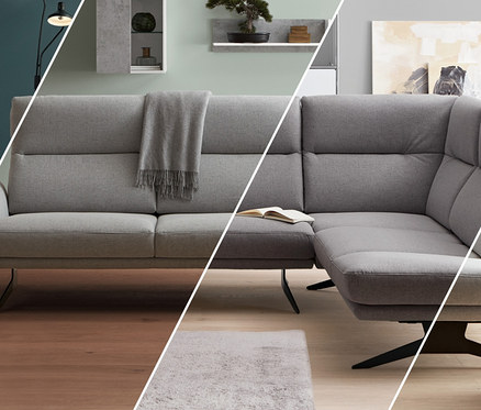 Wohnzimmer mit Highboard-Vitrine mit betonfarbenem Akzent.