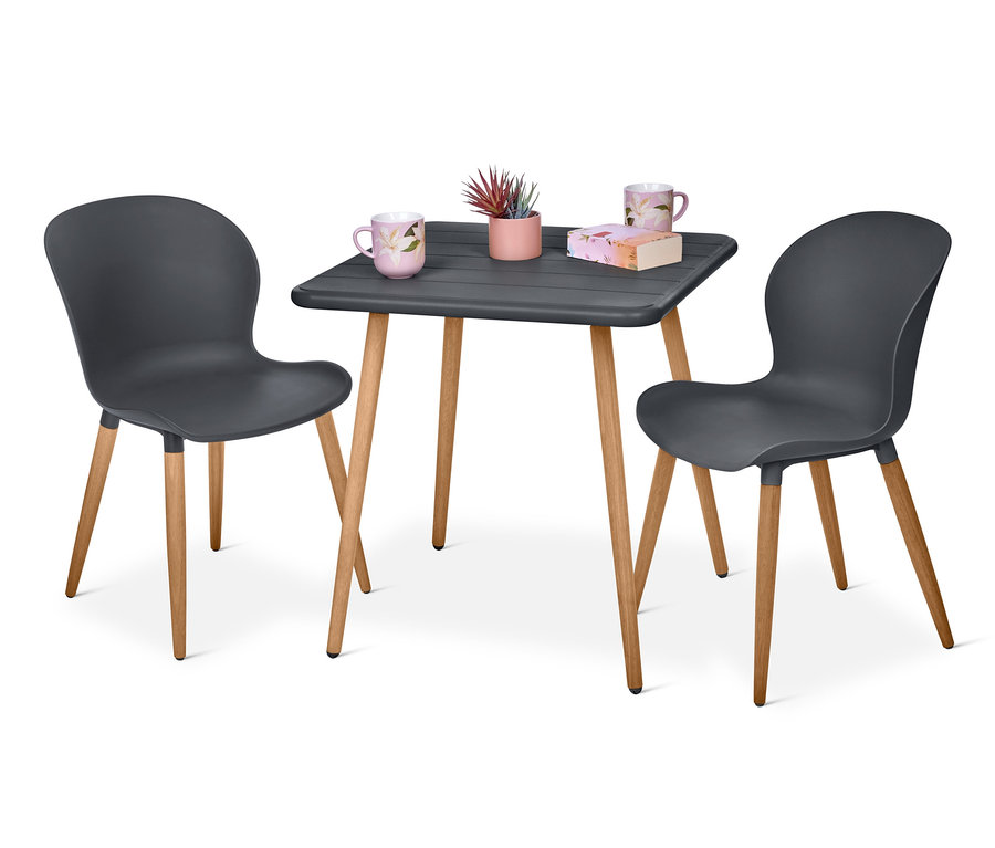 Graues 3-teiliges Gartenset mit Blumen und Buch auf dem Tisch.