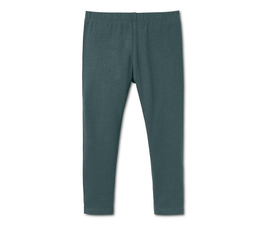 Eine grüne Jersey-Leggings.