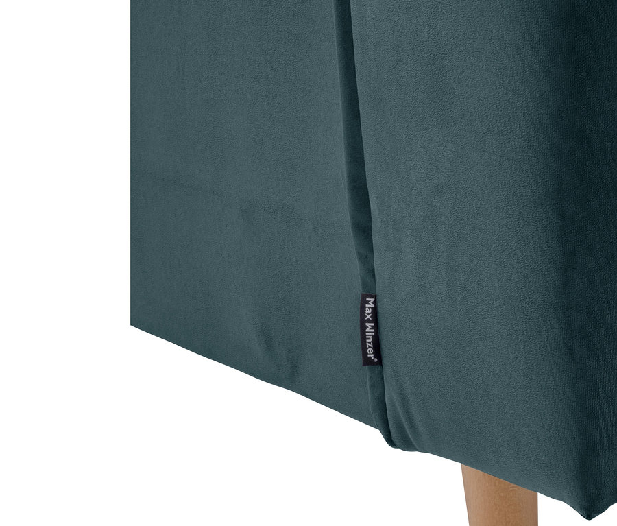 Detailansicht eines azurblauen Max Winzer® Sessels »Jolene« mit Holzbeinen.