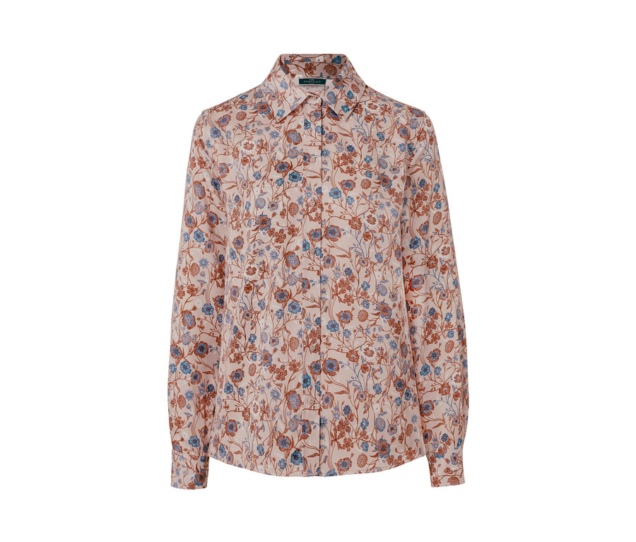 Detailaufnahme einer floralen Bluse.