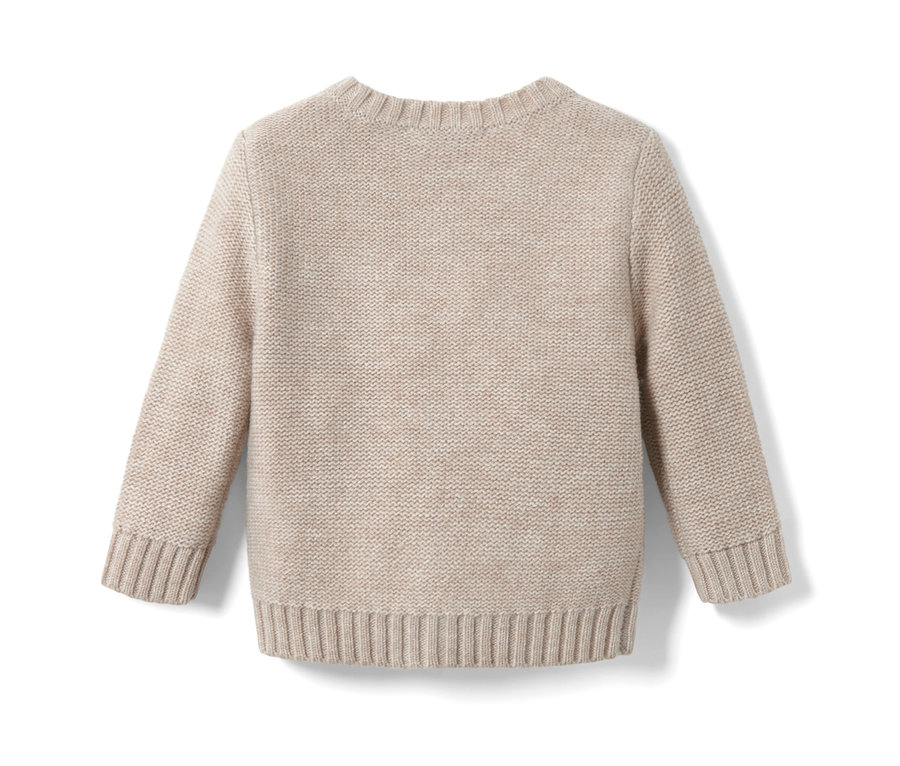 Rückseite einer Baby-Grobstrickjacke mit RWS-Wolle.