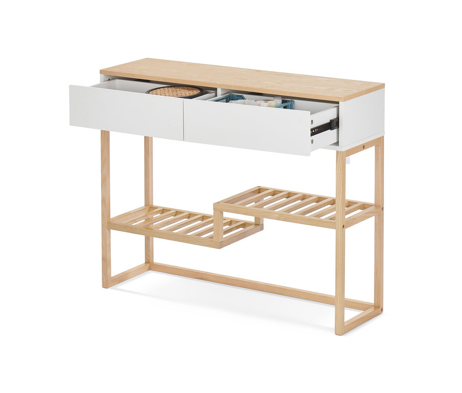 Detailansicht einer Konsole mit Schubladen, wobei eine Schublade offen ist.