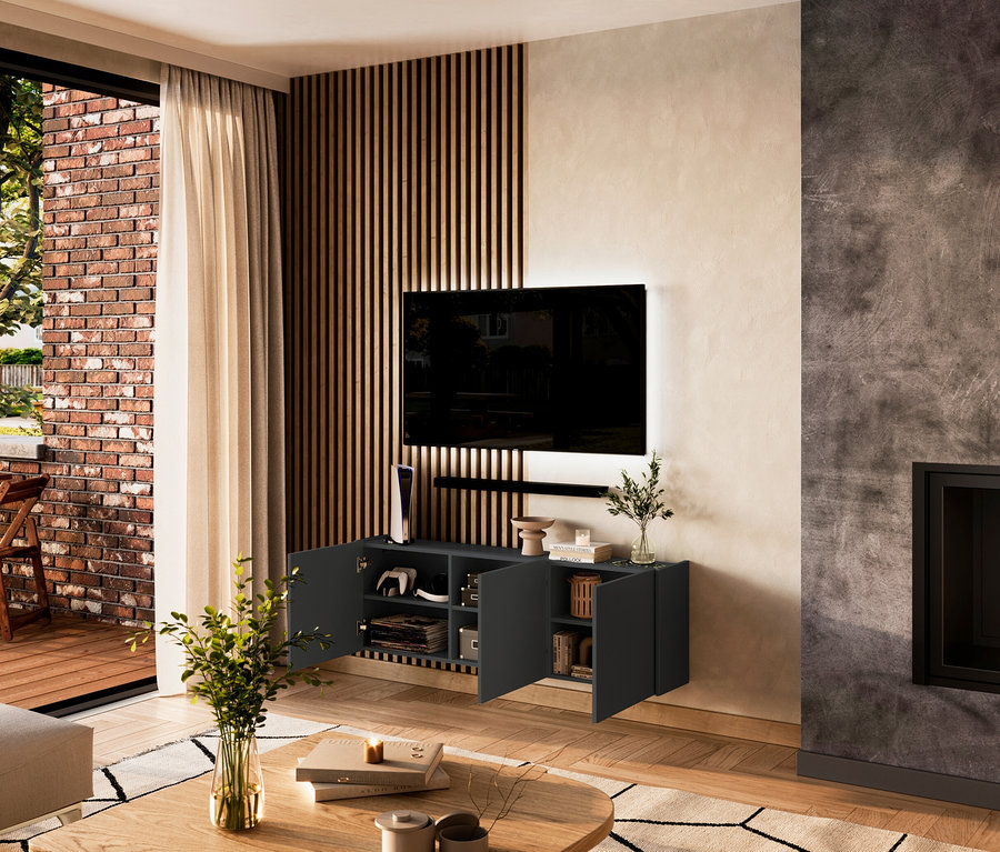 Wohnzimmer mit Fernseher über einem graphitfarbenen Mehrzweckschrank »Piana« mit 3 Türen.