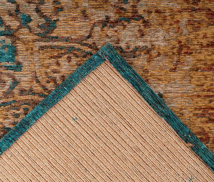 Detailansicht einer Ecke des sand-blauen Kayoom Kurzflorteppichs »Primavera 725«.