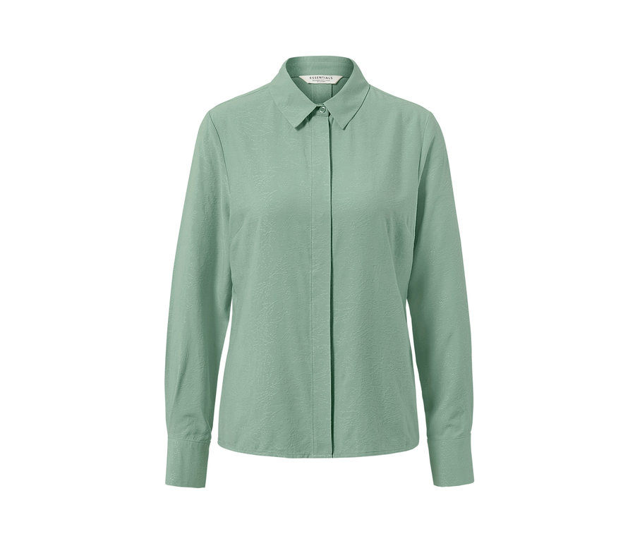 Eine grüne Jacquard-Bluse mit langen Ärmeln.