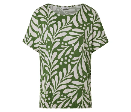 Ein grünes T-Shirt mit einem weißen Blätter- und Punktmuster.