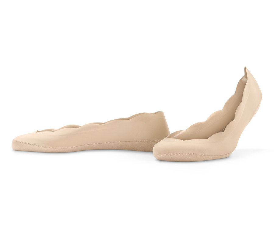 Zwei Paar Magic-Cut-Füßlinge in Beige auf weißem Hintergrund.
