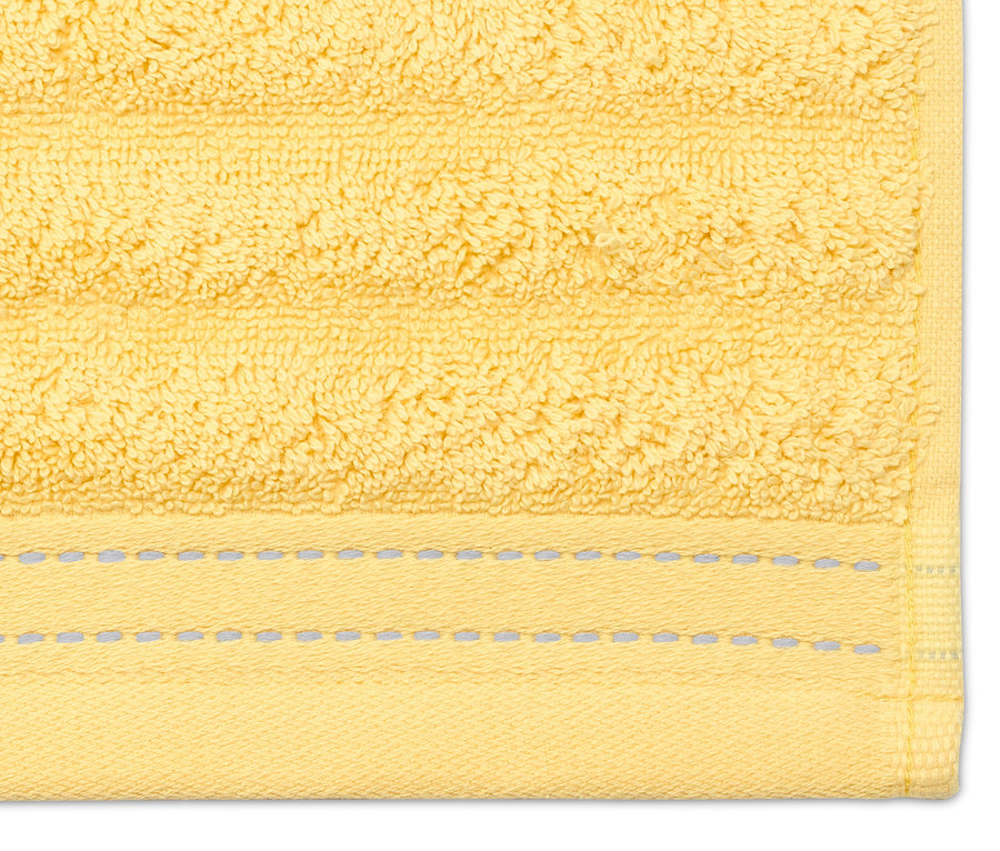 Detailaufnahme eines gelben Premium-Handtuchs.
