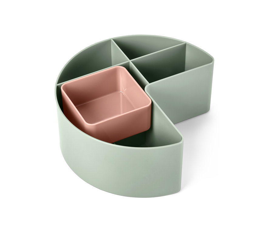 Ein grüner Beauty-Organizer mit einem rosa Fach.