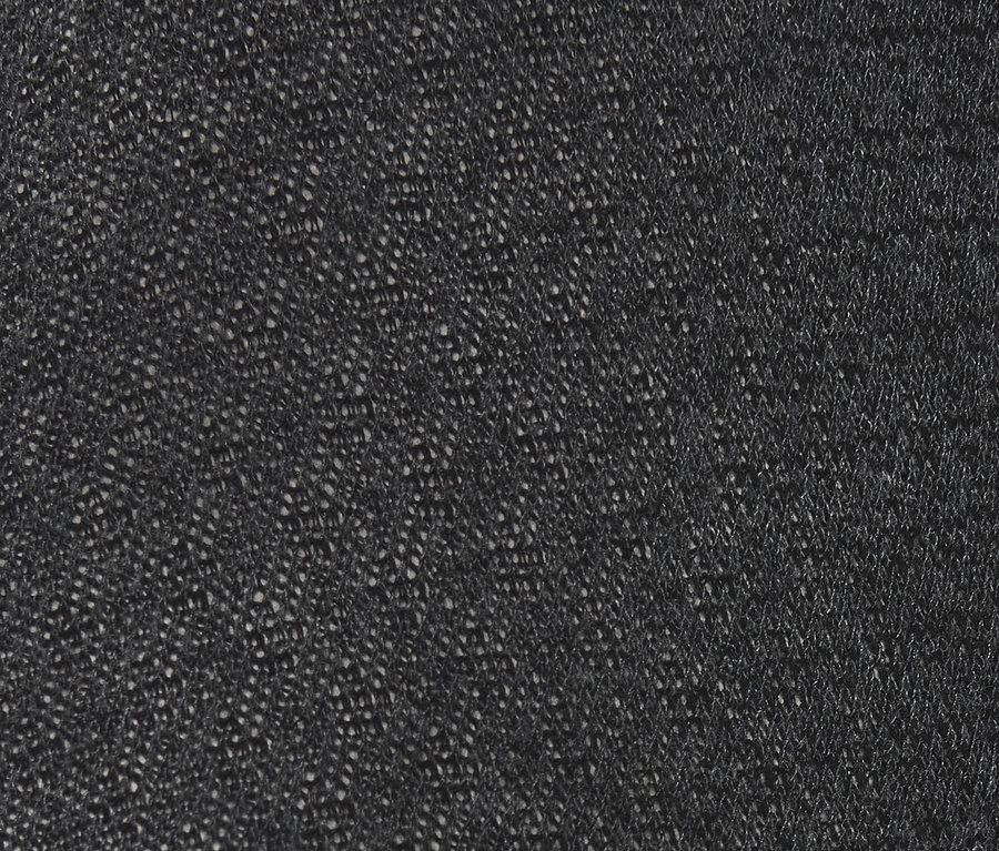 Detailaufnahme einer Strickstrumpfhose mit Struktur.