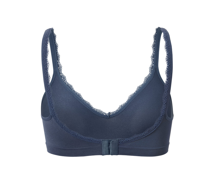 Detailaufnahme eines blauen Seamless-Soft BHs mit Spitzenbesatz.