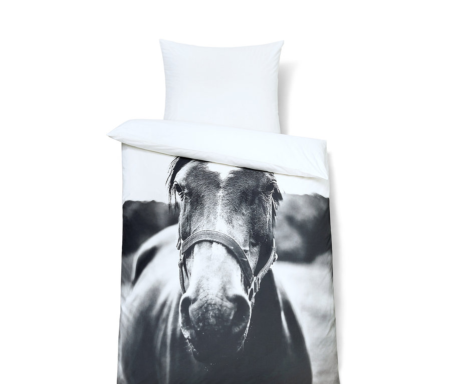 Nahaufnahme von Perkal-Pferde-Bettwäsche, Normalgröße, mit weißem Kissen.