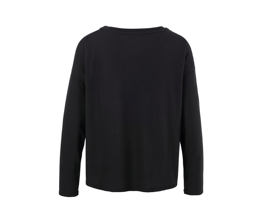 Detailansicht eines schwarzen 2-in-1-Sportshirts.