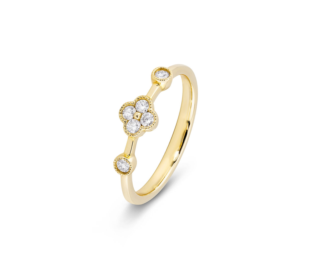Nahaufnahme eines goldenen 585 Goldrings mit Diamanten in Form einer vierblättrigen Blume.