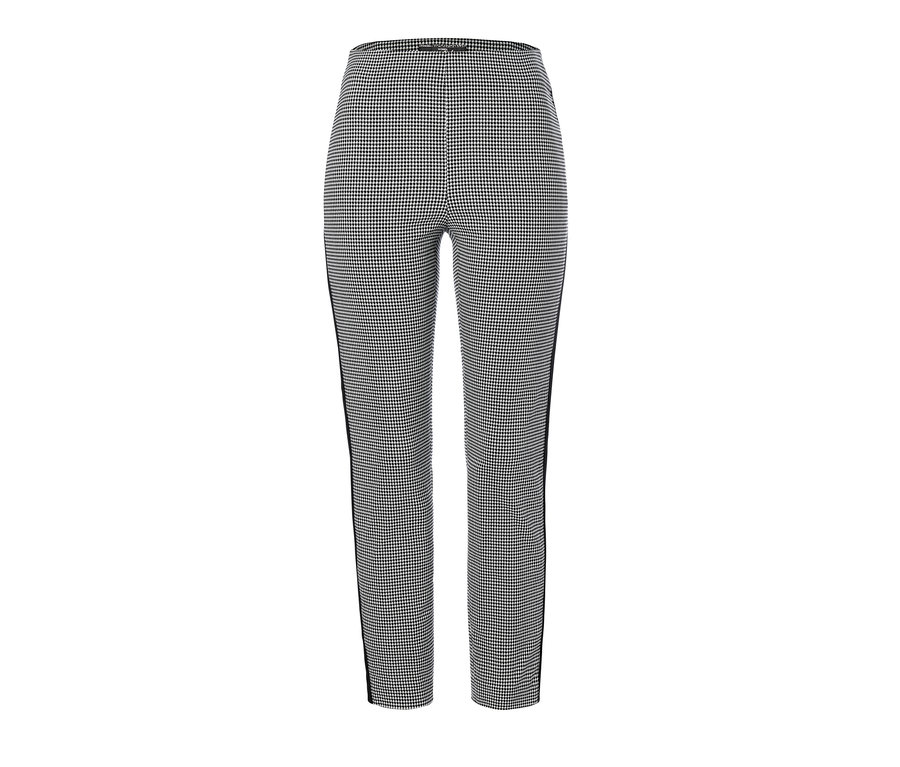 Eine schwarz-weiße knöchellange Stretchhose mit Hahnentrittmuster.