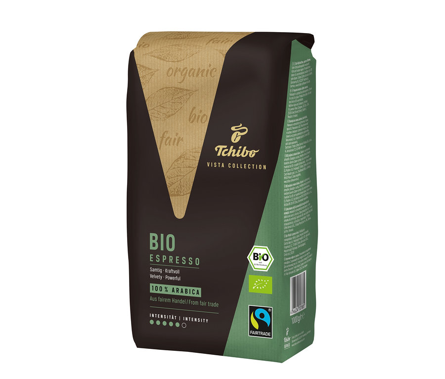 Eine Packung Vista Collection Bio Espresso - 1x 1 kg Ganze Bohne. Die Packung ist braun und hat Aufschriften in Grün und Beige. Auf der Packung befinden sich Bio- und Fairtrade-Logos.