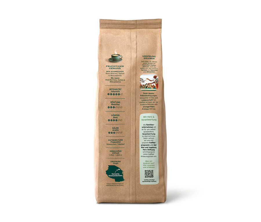 Eine hellbraune Kaffeepackung Farmkaffee Machare, 500 g Ganze Bohne, steht aufrecht. Auf der Vorderseite sind Informationen zu fruchtigem Geschmack, Intensität, Röstung, Körper, Säure und Herkunft Tansania, Kilimandscharo abgebildet.