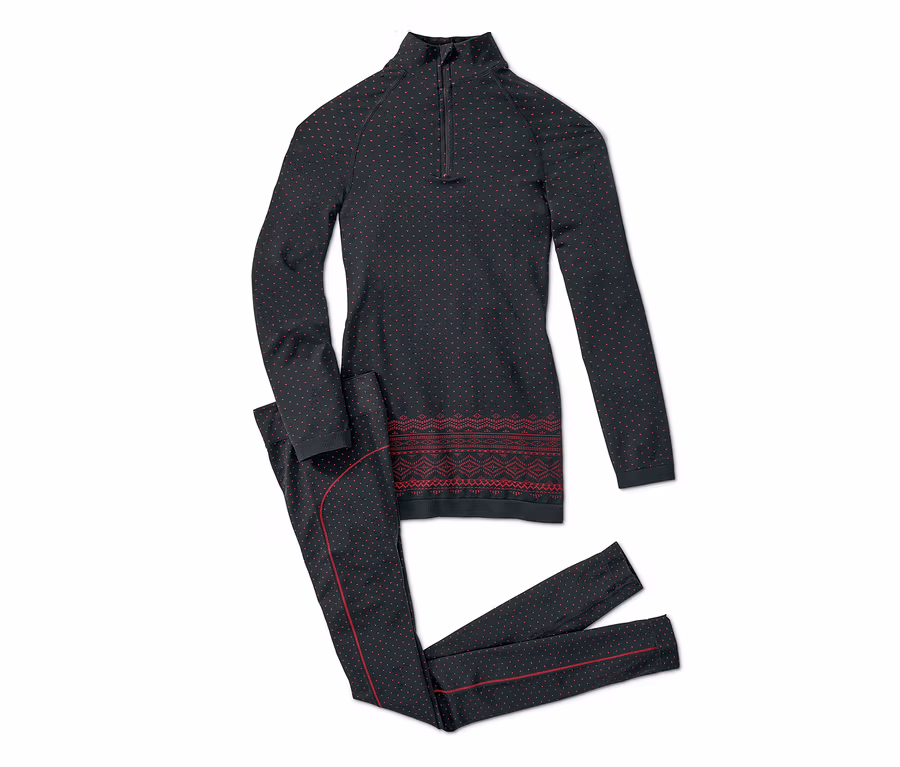 Schwarze Seamless-Funktionsunterwäsche mit roten Punkten und Norwegermuster.