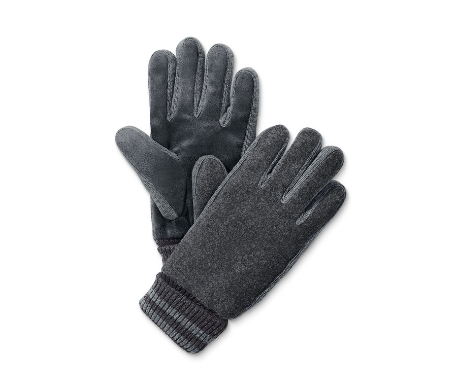 Zwei graue Handschuhe liegen auf einem weißen Hintergrund.
