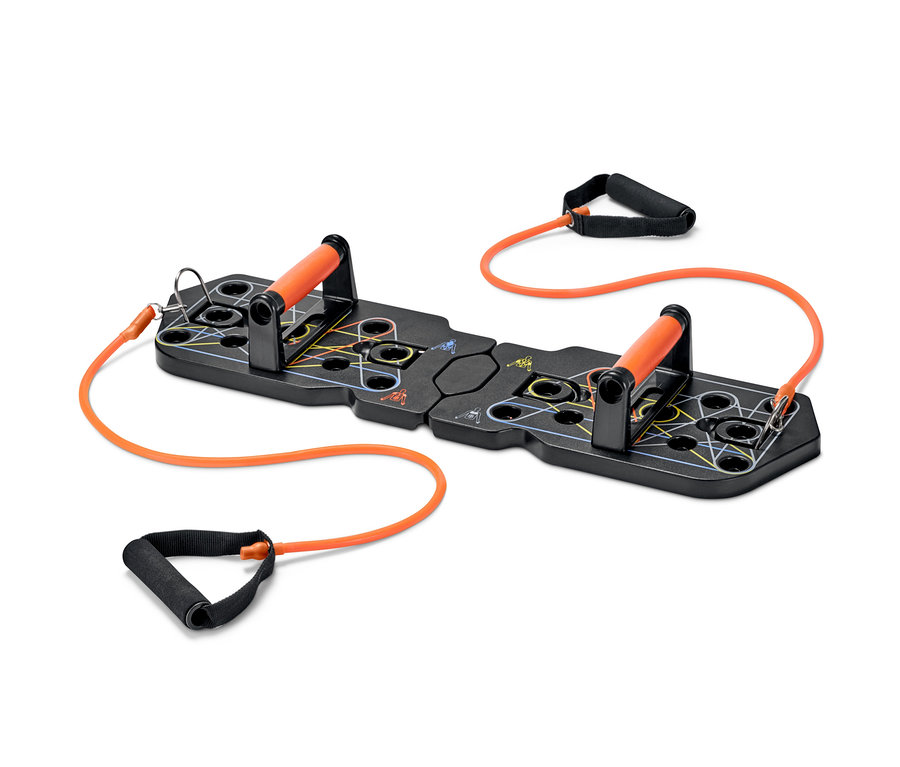 Ein Liegestütz-Board mit orangen Elastikbändern und Griffen.