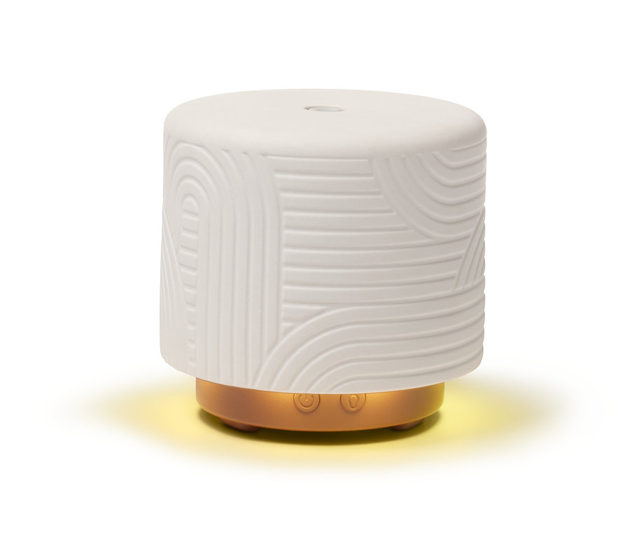 Ein weißer Aromadiffusor mit Reliefmuster