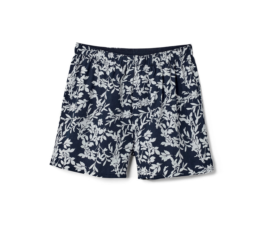 Blaue Web-Boxershorts mit Alloverprint.