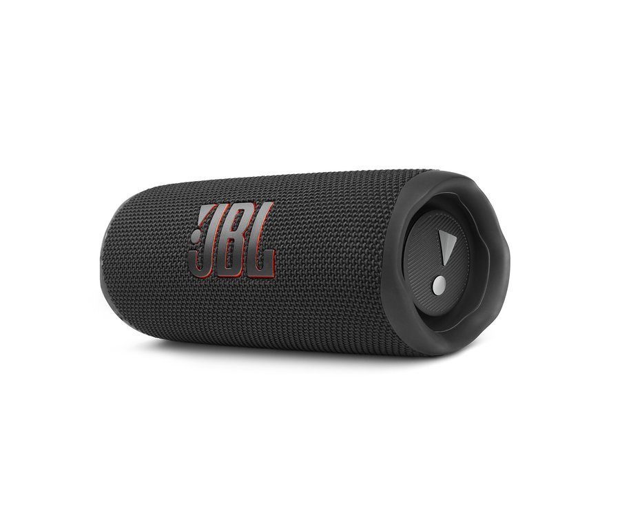 Ein schwarzer JBL Flip 6 Lautsprecher liegt horizontal.