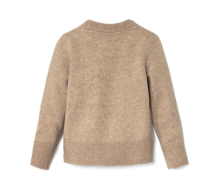 Detailansicht eines Kleinkind-Strickpullovers mit Applikation.