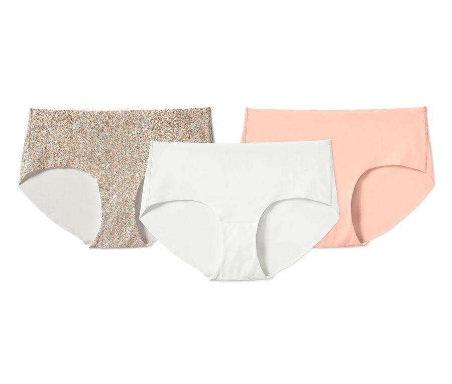 Drei Magic-Cut-Pantys: geblümt, weiß und pfirsichfarben.