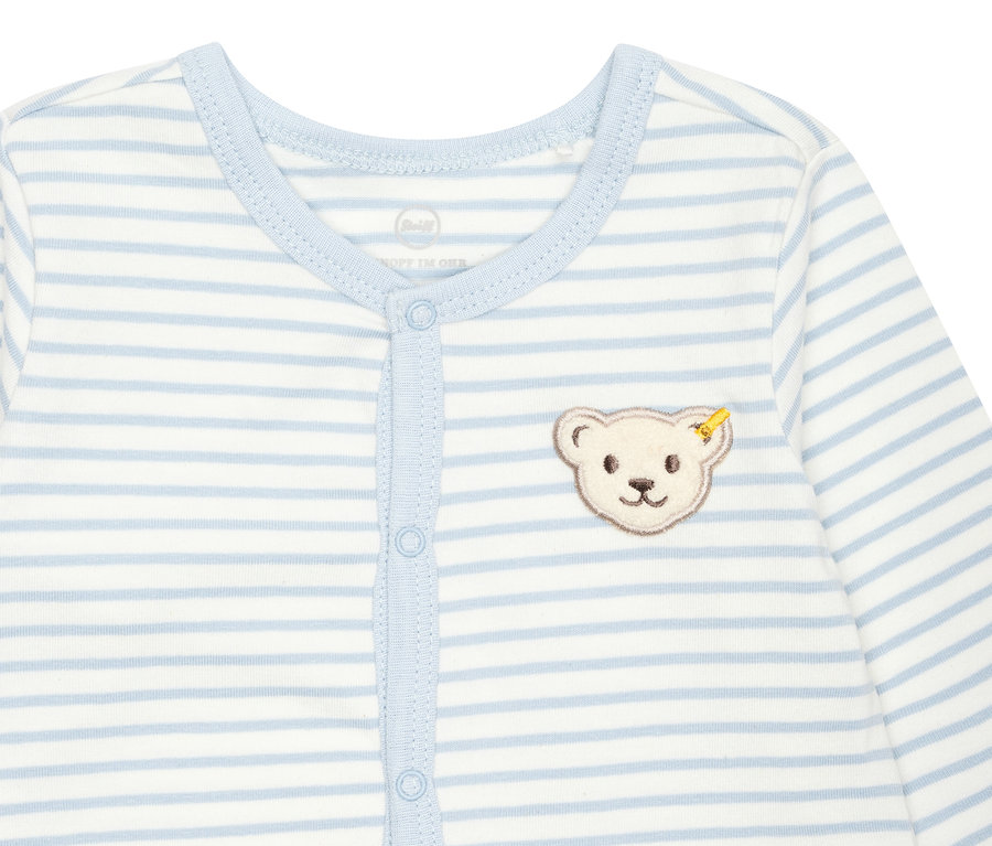 Hellblau-weiß gestreifter Steiff Baby-Strampler mit Knopfleiste und Teddybär-Applikation.