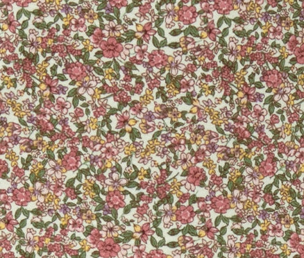 Nahaufnahme eines Stoffs mit Blumenmuster. Blusenshirt mit 3/4-Arm.