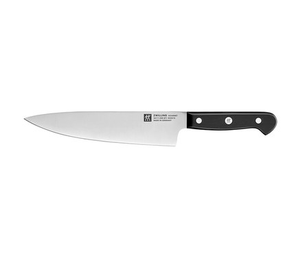 Ein ZWILLING Selbstschärfender Messerblock »Gourmet« Messer mit schwarzem Griff.