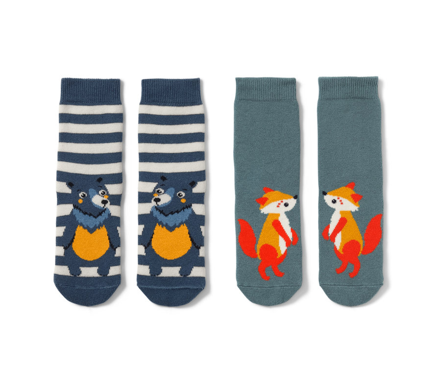 Zwei Paar Kleinkind-Antirutsch-Socken mit Bär- und Fuchs-Motiv.