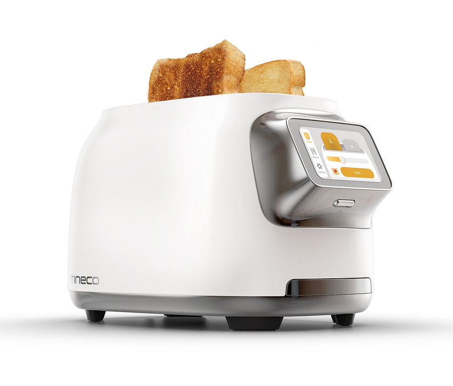 Zwei Toastscheiben ragen aus dem weißen Tineco Toaster »Toasty One«.
