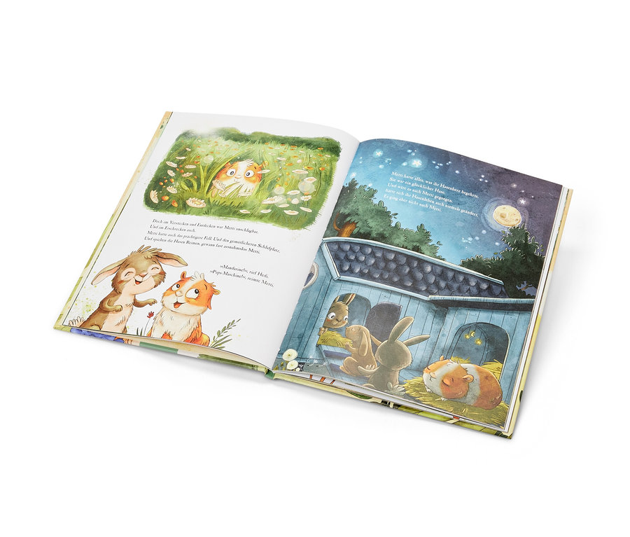Aufgeschlagenes Buch mit Illustrationen von einem Hasen und einem Meerschweinchen, Produkt ist »Metti Meerschwein«.