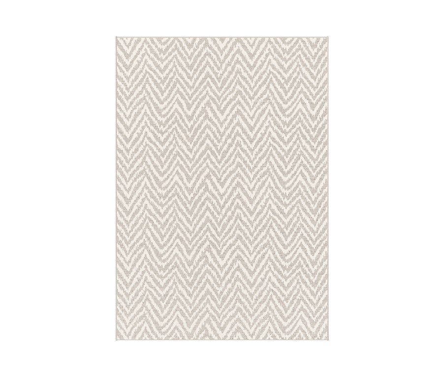 Ein Outdoor-Teppich »Ecru Flow« mit beigem Zickzackmuster.